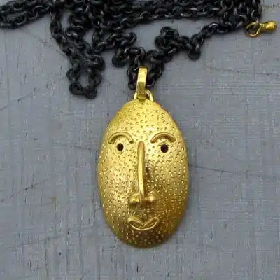 Handmade 22 karat gold Face pendant