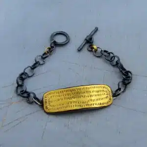 22k gold bar and silver bracelet