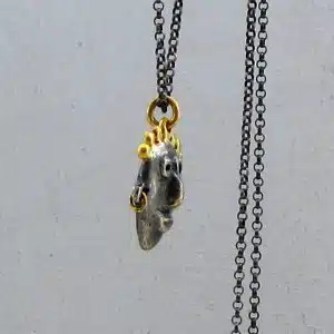 face 22k gold and silver pendant necklace