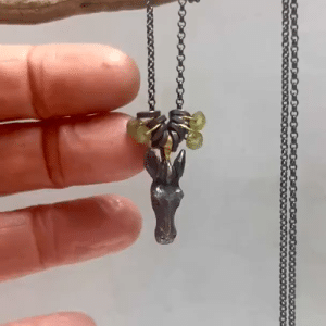 Zebra head, Peridot and 22k gold and silver necklace