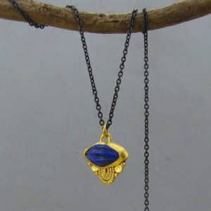 Carved Lapis Lazuli 24 karat pendant