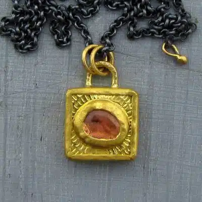 24k gold Tourmaline pendant on silver necklace