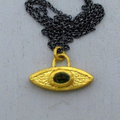 Peridot Evil Eye 24 karat gold pendant necklace