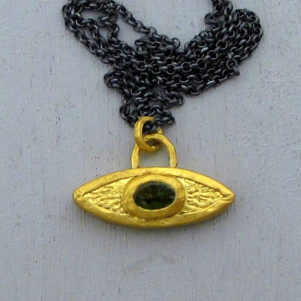 Peridot Evil Eye 24 karat gold pendant necklace