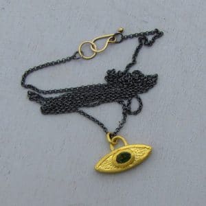 Peridot Evil Eye 24 karat gold pendant necklace