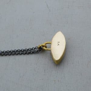 Peridot Evil Eye 24 karat gold pendant necklace