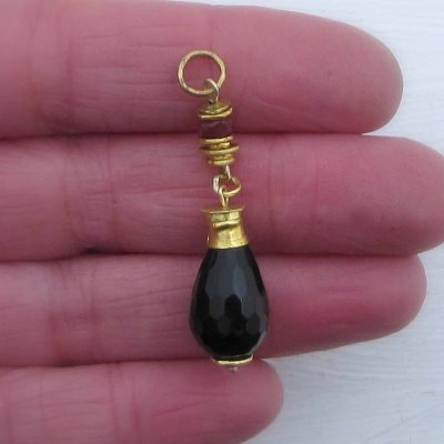 Onyx and Ruby Briolette 24k gold pendant
