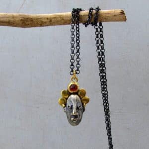 22 karat gold and silver Zircon face necklace