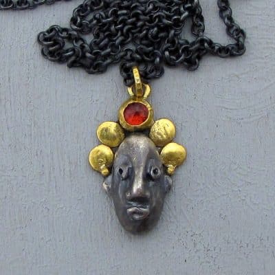 22 karat gold and silver Zircon face necklace