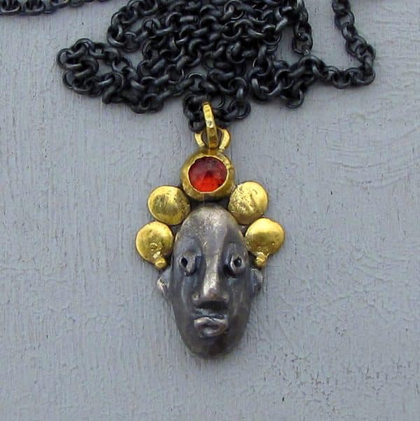 22 karat gold and silver Zircon face necklace