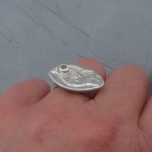 Handmade silver and Peridot bird ring